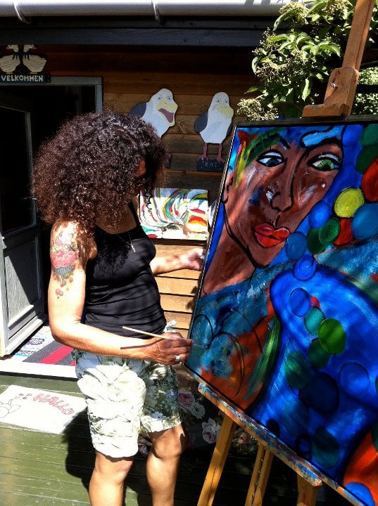 Me painting in our allotment house