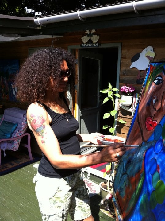 Me painting in our allotment house